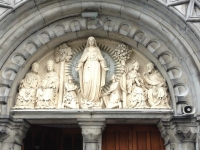ah, this is unusual, the virgin guardian the entrance, the templars were devoted to the virgin, see how she's stepping over the snake of evil