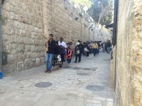 A procession in the Via Dolorosa, researches shows that this may not have been the way that Jesus took, is way too long for a dying man carrying a patibulum, it would have died half way through... but yet again, who really knows? This is all about faith