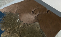 A still image showing the ice sheet removed in the region around the Hiawatha Glacier. The bed topography under the ice clearly shows the Hiawatha crater.