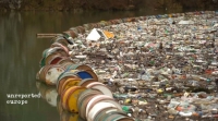 Drina River, Bosnia & Herzegovina. A fragile barrier stops rubbish from going downstream on an already polluted river depleted of wild live, a prime example of what’s happening in every single river in the world